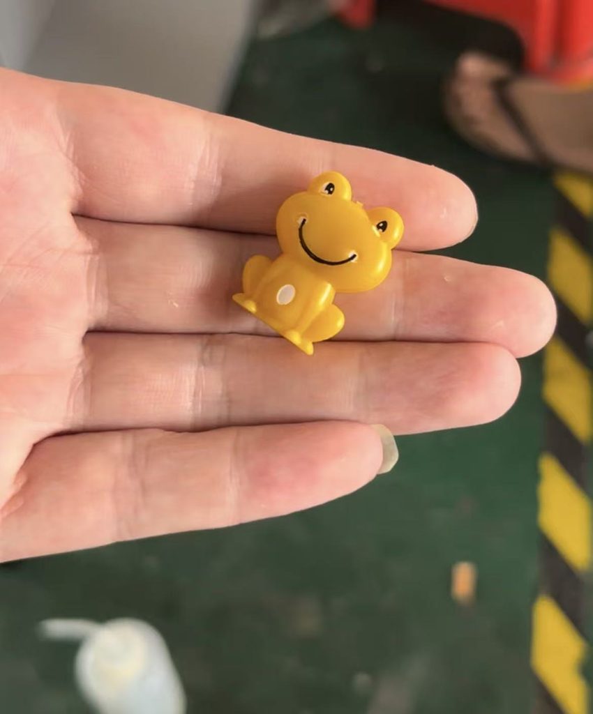 Small plastic printed workpiece after pad printing